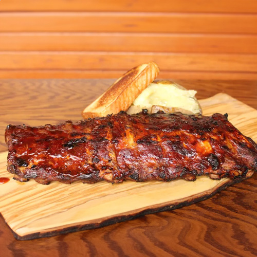 One full rack of baby back ribs